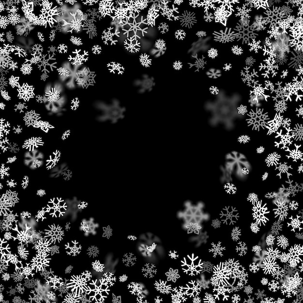 Snowfall background with snowflakes blurred in the dark