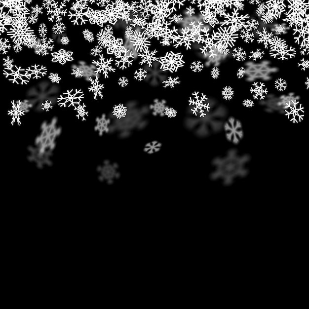 Snowfall background with snowflakes blurred in the dark