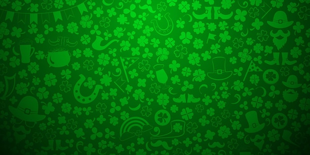 St. Patrick's Day background made of clover leaves and other symbols in green colors