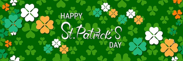 St.Patrick's Day vector banner template. Green background with colorful clover leaves