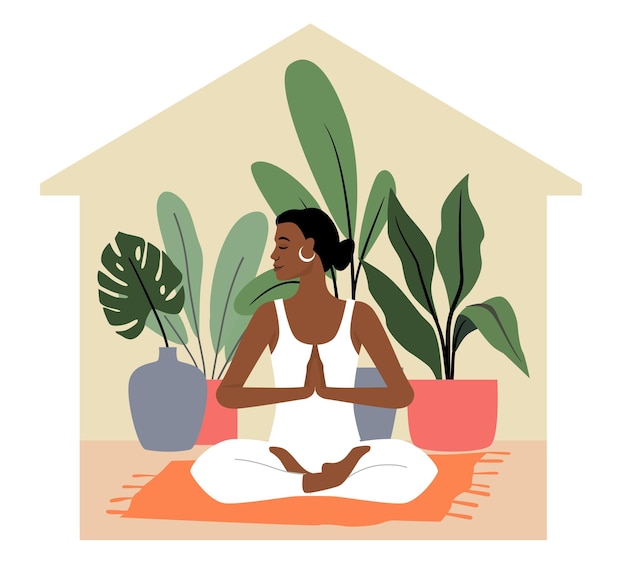 Stay home concept. Woman practicing yoga and meditation in cozy interior