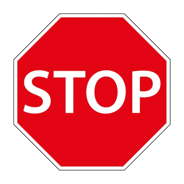 Stop traffic sign on a white background in a close up vieww