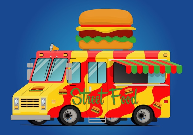 Street food truck with big hamburger on the roof