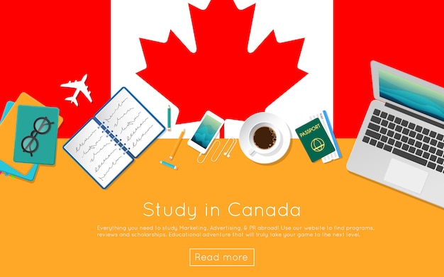 Study in Canada concept for your web banner or print materials. Top view of a laptop, books and coffee cup on national flag. Flat style study abroad website header.