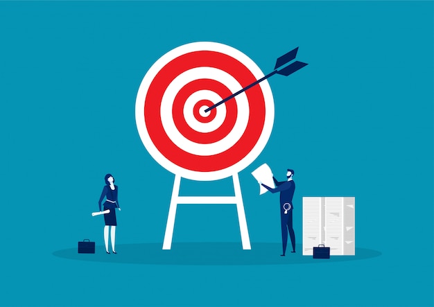 Target with arrow, businessman with woman planing target concept