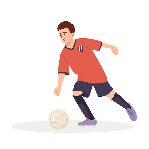 Teenage boy football player in a red sports shirt kicks a soccer ball Kid sportsman playing football