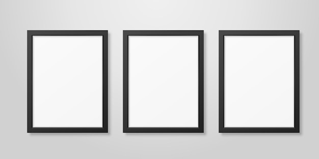 Three Vector Realistic Modern Interior Black Blank Vertical A4 Wooden Poster Picture Frame Set Closeup on White Wall Mockup Empty Poster Frames Design Template for Mockup Presentation