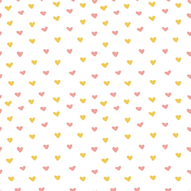 Tiny yellow and pink hearts seamless pattern.