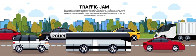 Traffic Jam With Cars And Bus On Road Over City Buildings