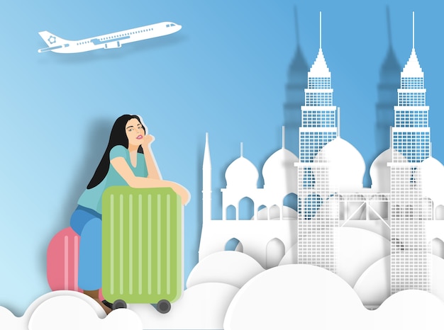 Traveling woman with suitcase on Malaysia background