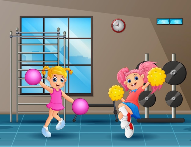 Two cute girls practicing cheerleading in gym