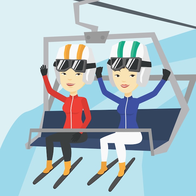 Two happy skiers using cableway at ski resort.