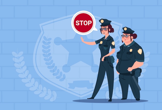 Two Police Women Holding Stop Sign Wearing Uniform Female Guards On Blue Bricks Background