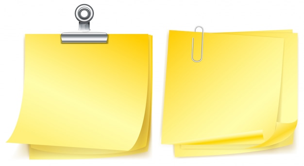 Two yellow papers with paperclips