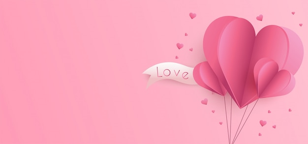 Valentine's Day background with paper cut hearts 