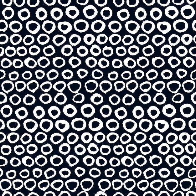 Vector seamless artistic pattern. Hand drawn doodle dots, circles white on black background. Use for design, cards, fabric, decoration, etc.