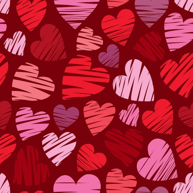 Vector seamless pattern of pink and red hearts on a burgundy background