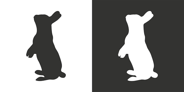 Vector sitting Hare silhouette isolated on white White sitting Rabbit on black background.