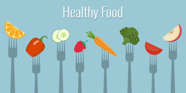 Vegetables and fruits on forks. Healthy food 