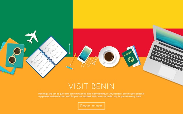 Visit Benin concept. Top view of a laptop, sunglasses and coffee cup on Benin national flag. Flat style travel planninng website header.