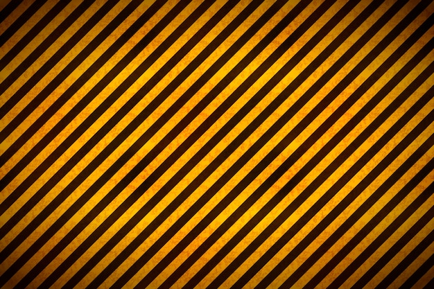 Warning yellow and black stripes with grunge texture, industrial background