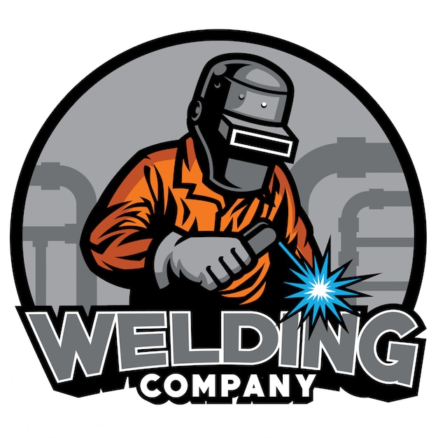 Welder working with weld helmet