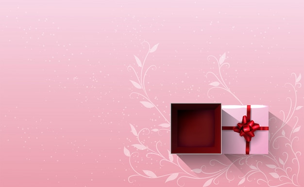 A white gift box tied with a red ribbon that was opened on a pink background.