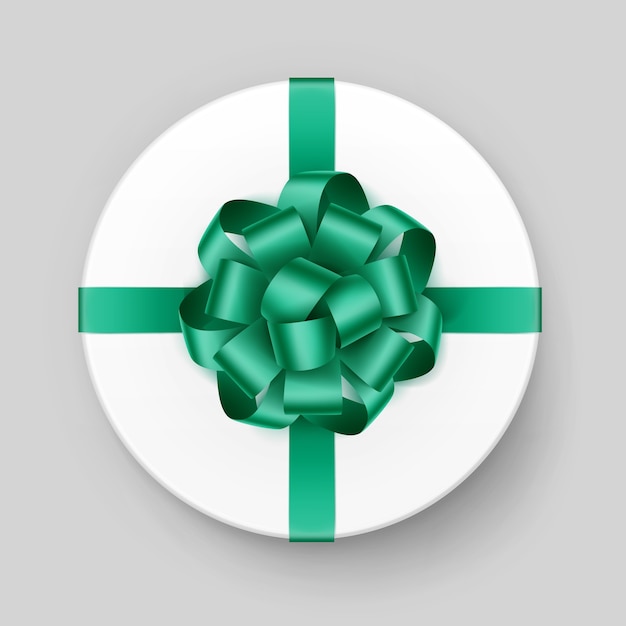  White Round Gift Box with Shiny Green Emerald Bow and Ribbon Top View Close up  on Background