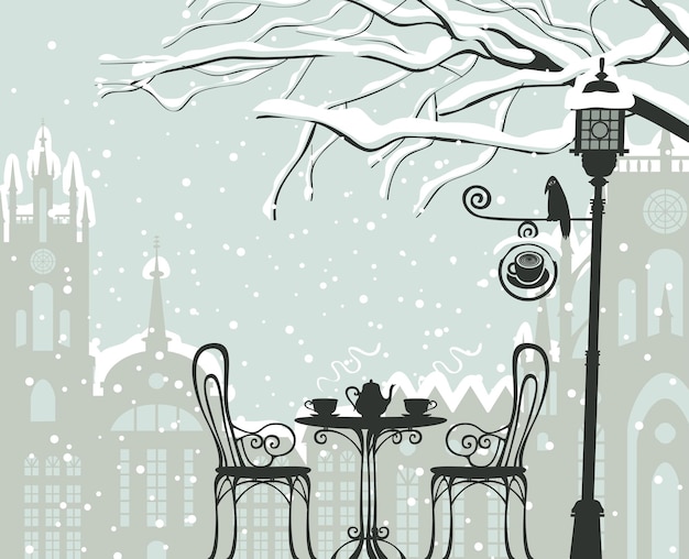 winter cityscape with street cafe