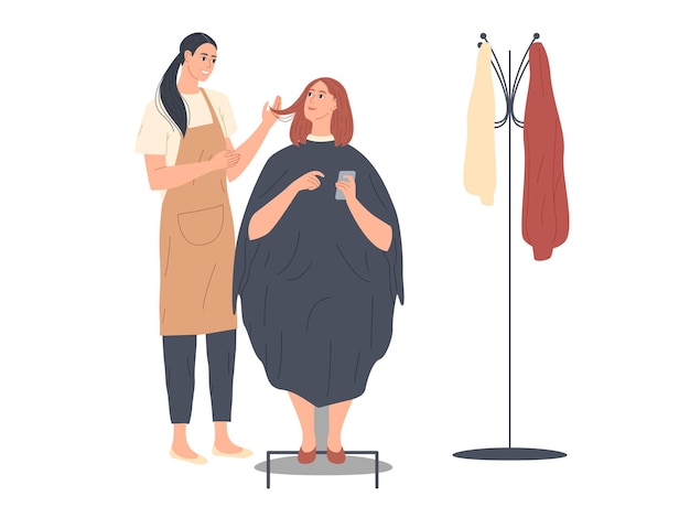 Woman discussing hairstyling with her hairdresser in the hairdressing salon