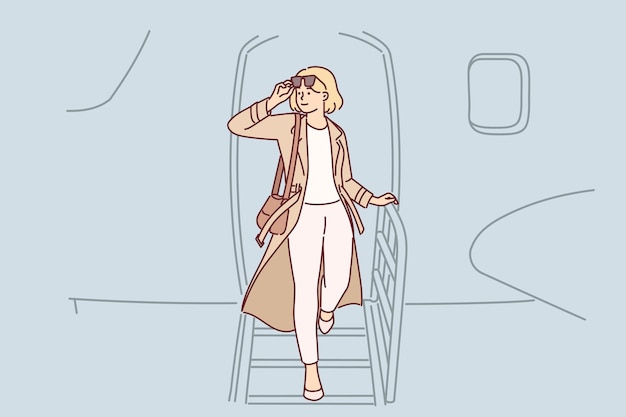 Woman gets off airplane having arrived on business trip on private flight to conclude contract