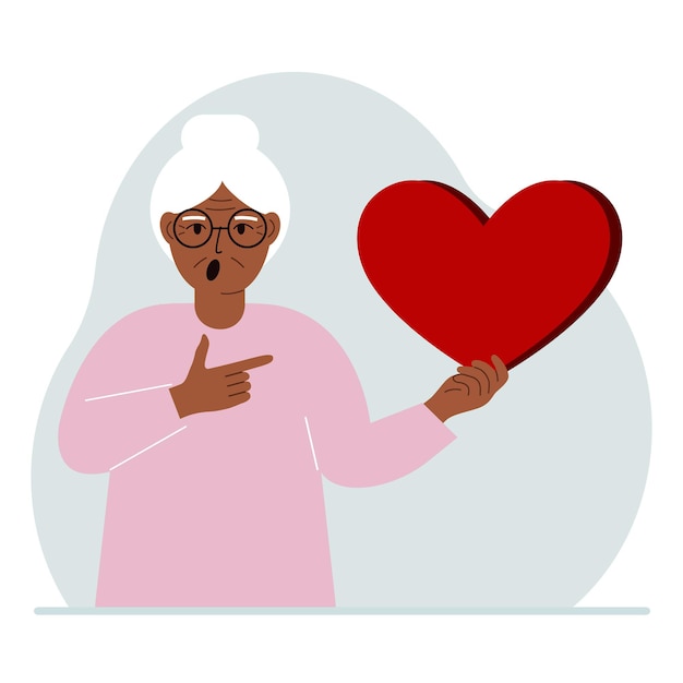 A woman holds a big red heart in his hand The concept of volunteering romantic relationship or love