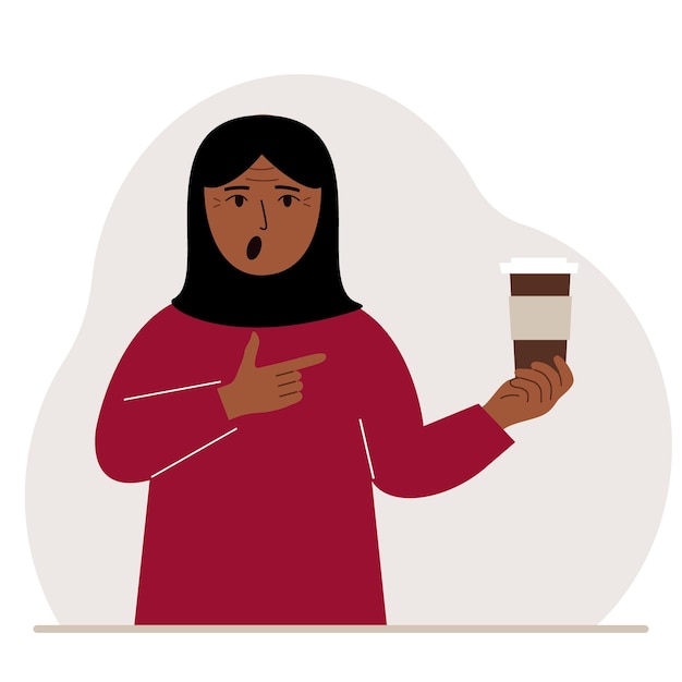 A woman holds a paper cup with coffee