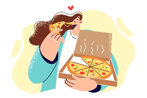 Woman holds pizza box and bites into piece of italian snack from fast food restaurant Young girl used pizza delivery service from pizzeria and enjoys delicious highcalorie lunch