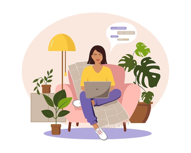 A woman is sitting on a chair with a laptop Concept for work study education work at home