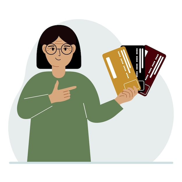 A woman shows plastic cards The concept of choosing a bank terms of deposits and loans