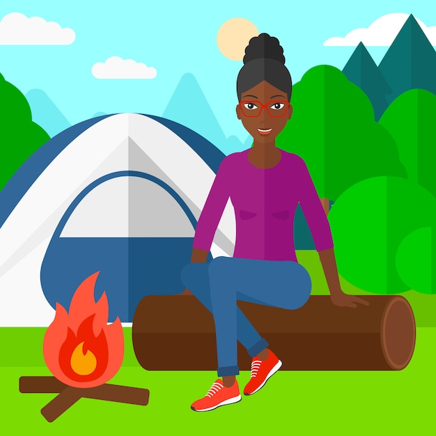 Woman sitting at camp.