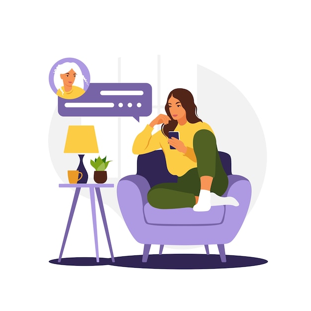 Woman sitting on sofa with phone. Working in phone.