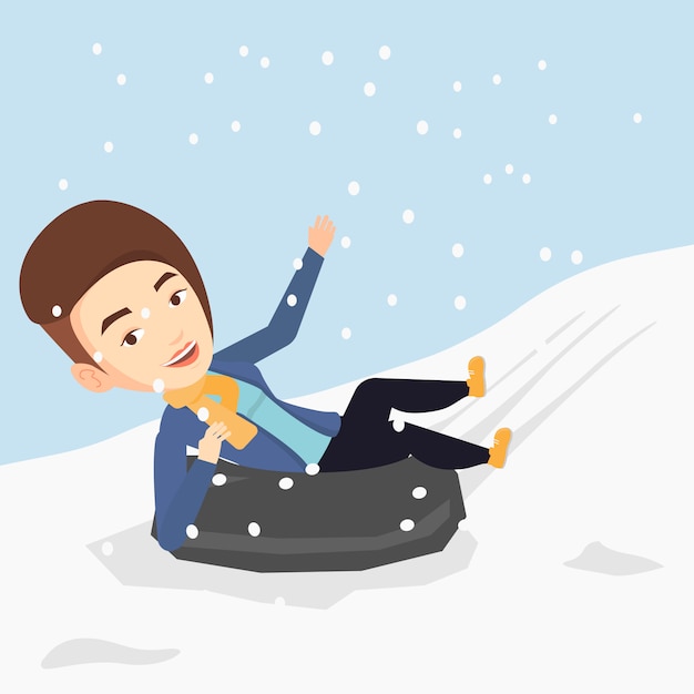 Woman sledding on snow rubber tube in mountains.