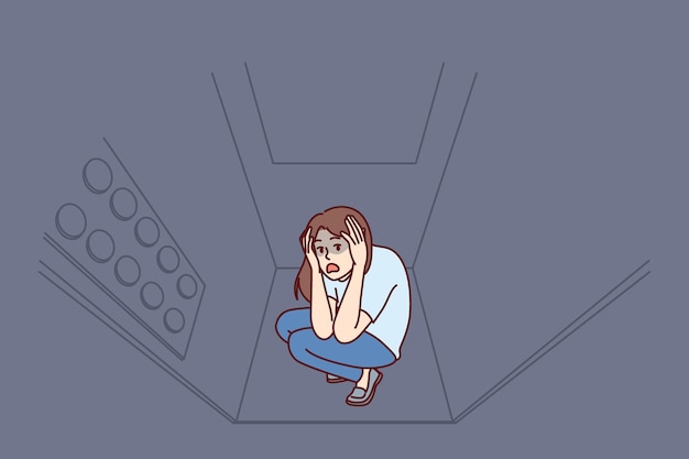 Woman stuck in elevator is claustrophobic and panic attack due to phobia of enclosed spaces