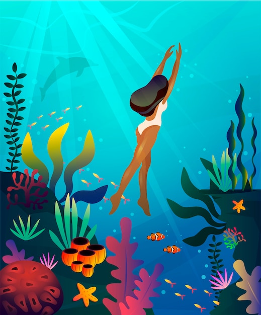 Woman swimming underwater in the ocean. Concept for Ocean Day or tourist agencies.