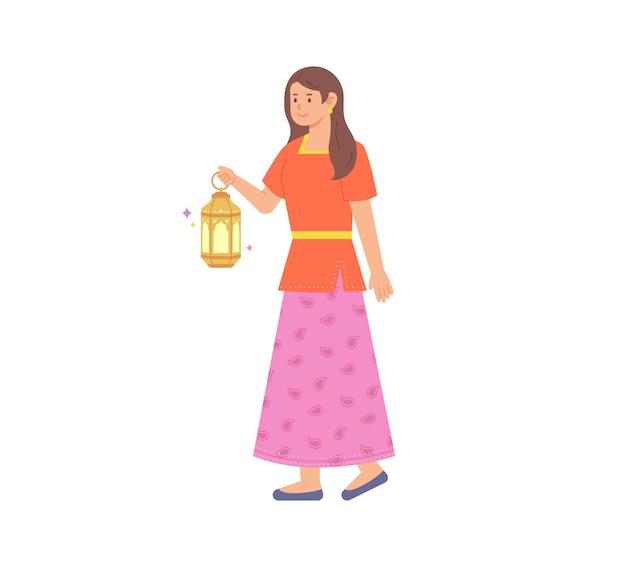 A woman in traditional Indian clothing is walking with a beautiful lantern