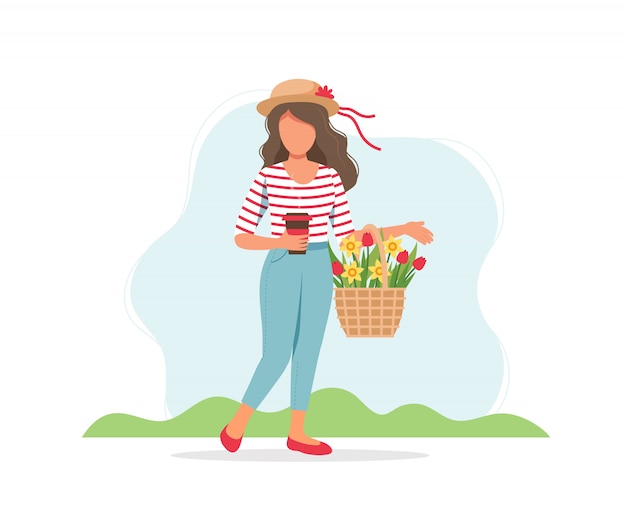 Woman with coffee cup and spring flowers in basket.