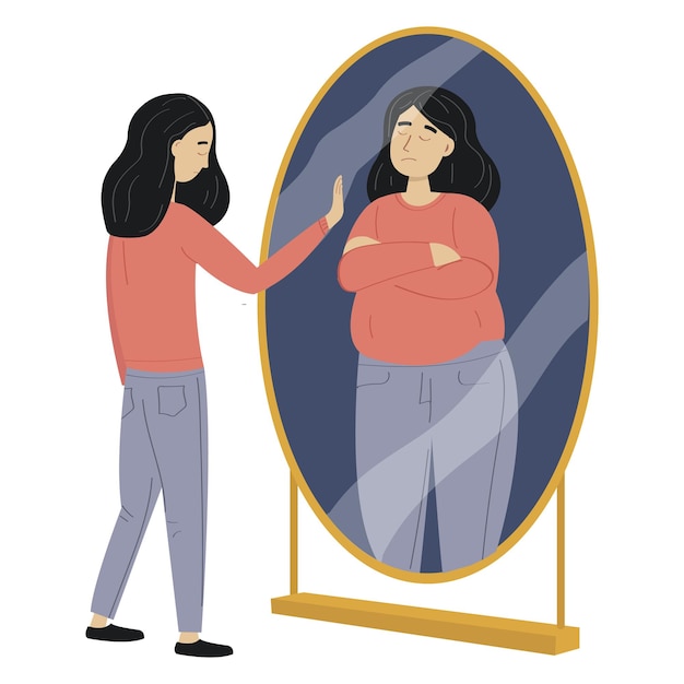 woman with eating disorder standing by the mirror