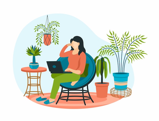 Woman with laptop on armchair in scandinavian style