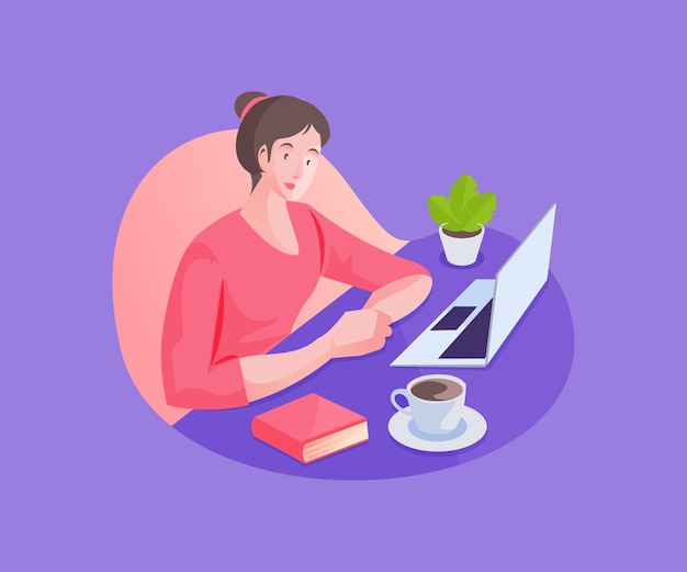 A woman working with a laptop at her desk