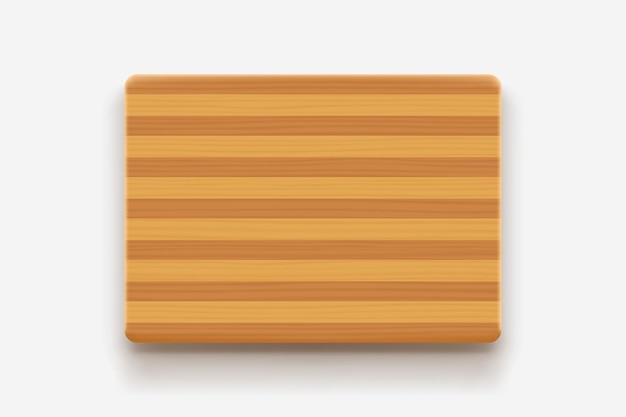 Wooden cutting board top view on white