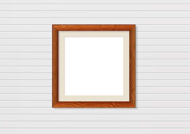 Wooden photo frame mockup on wall. Interior decoration