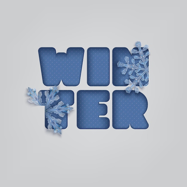 Word Winter with blue snowflakes. Paper cut letters on a light backdrop