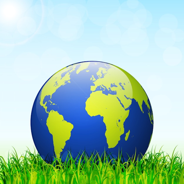 World environment day concept. Earth globe with green grass and blue sky